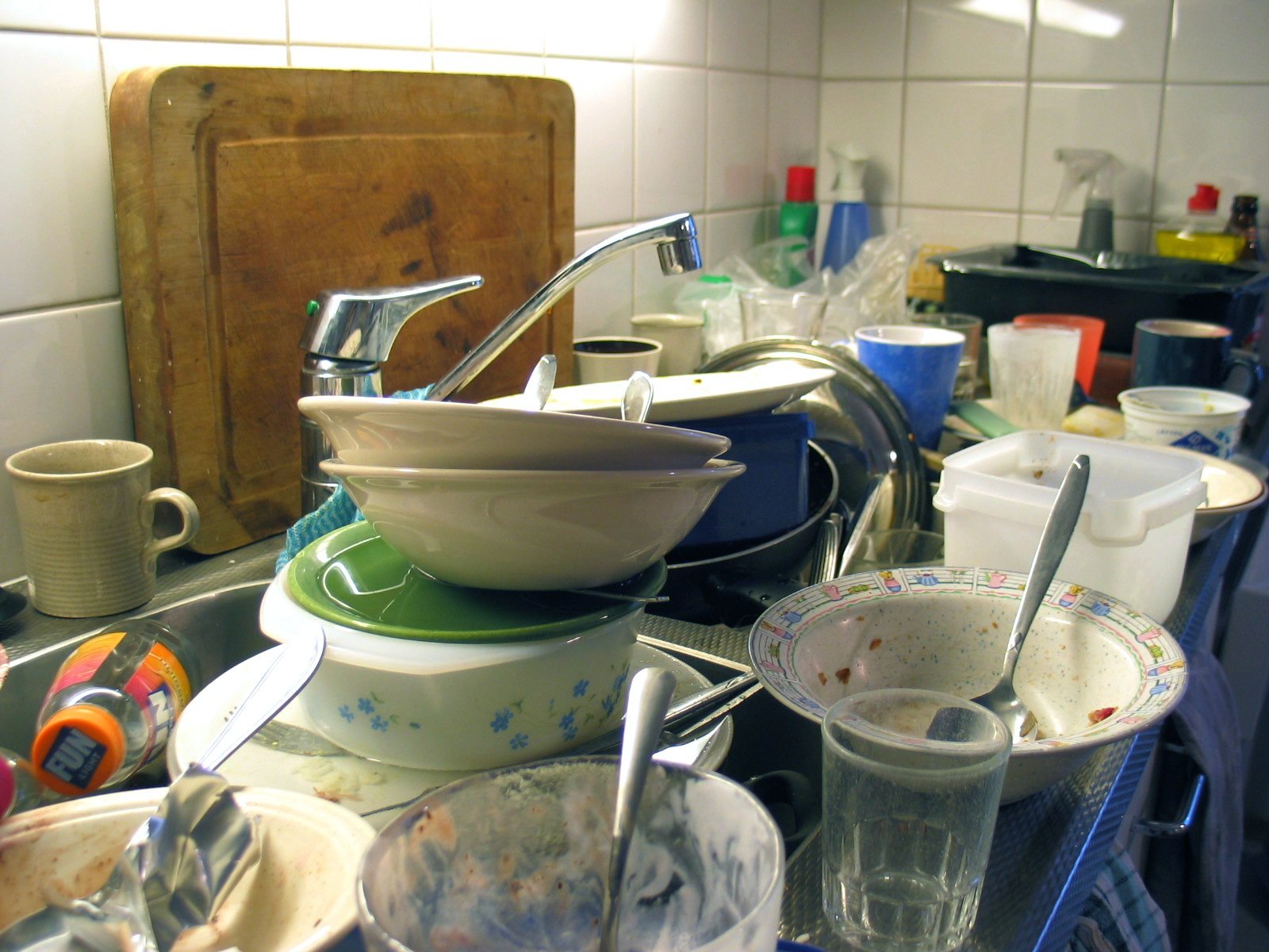 Piles of dirty dishes waiting to be washed up