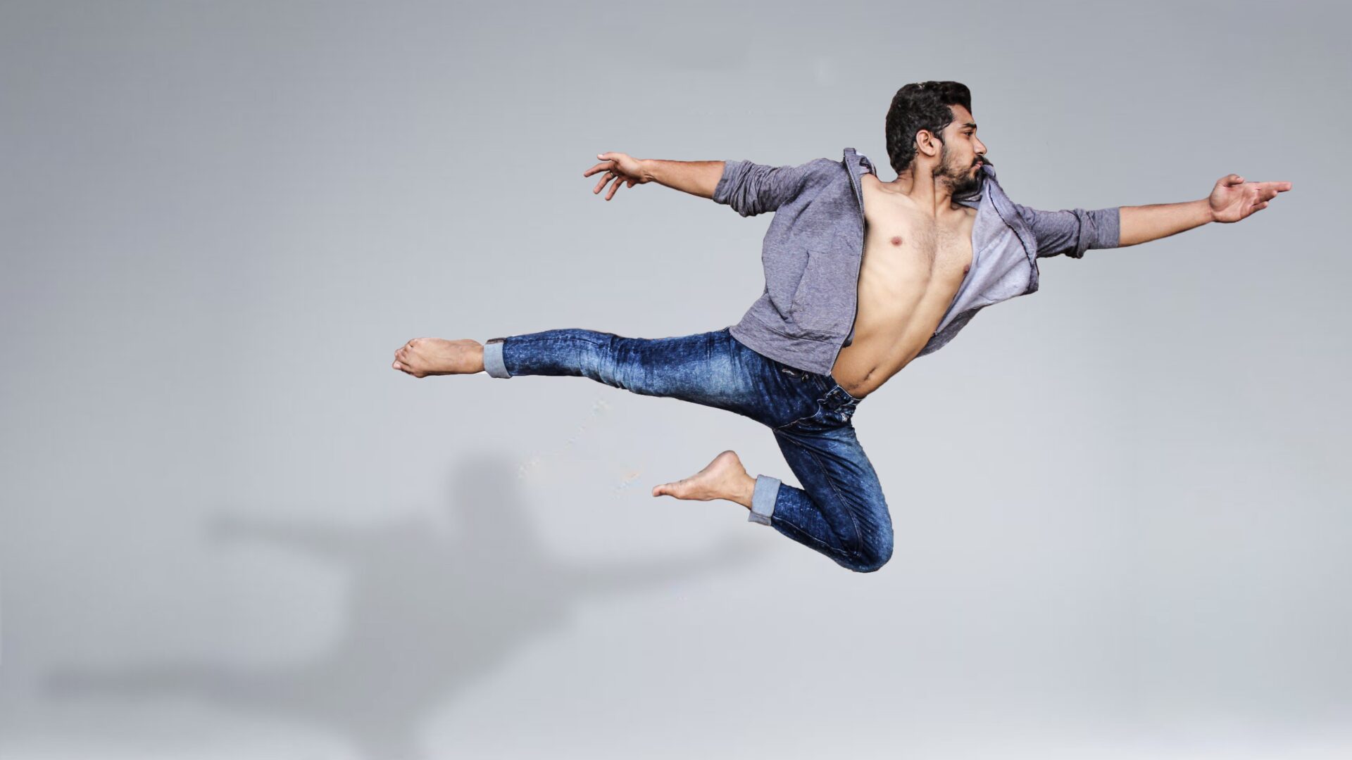 Man leaping through the air like a ballet dancer (Photo by Yogendra Singh from Pexels)