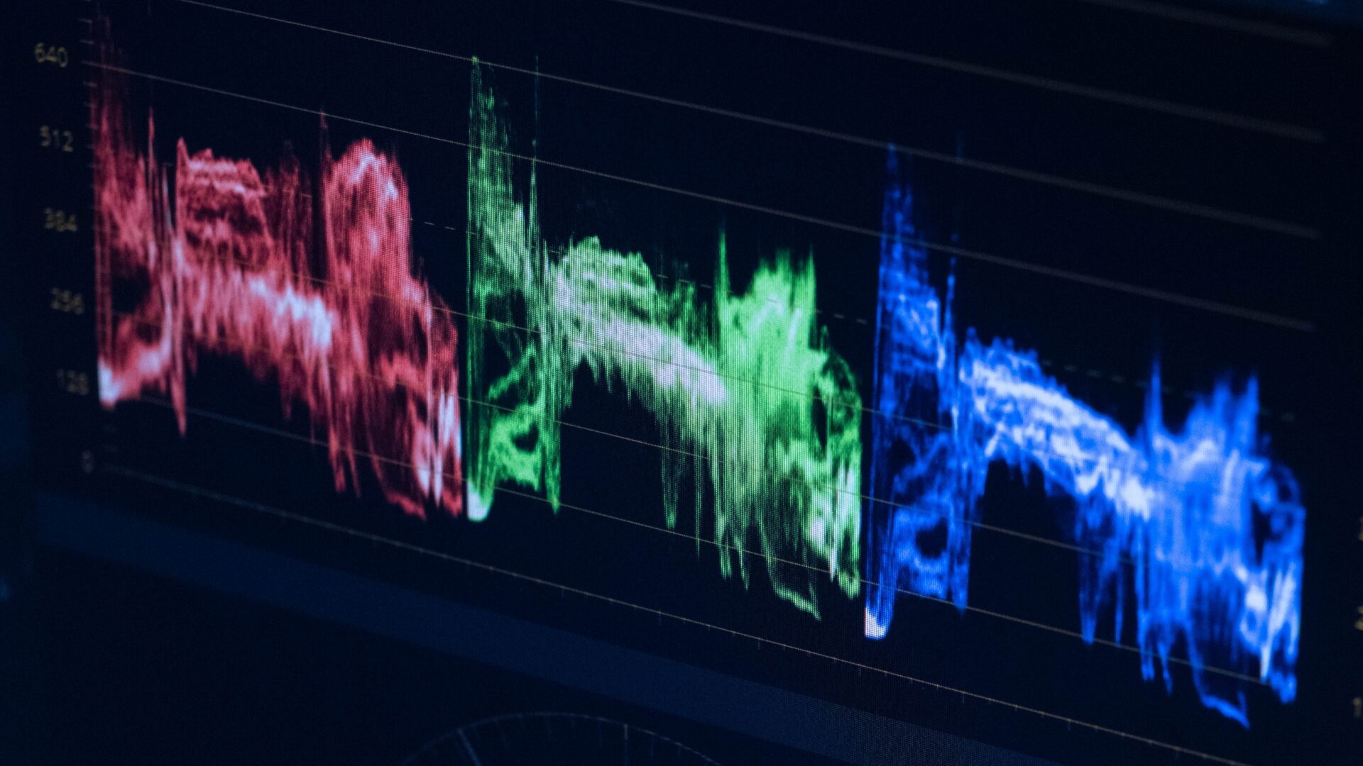 Colourful waveforms on a screen (Photo by Ron Lach on Pexels)